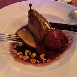 Chalet Gregoire - Poached pear cut open; Poires Pochees ou Vin Rouge et son Sobert Cassis (poached pears in red wine and blackurrand sorbert)