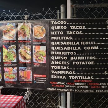 Angel's - a menu for tacoss on a fence - Mexican Near Me - Chino, California