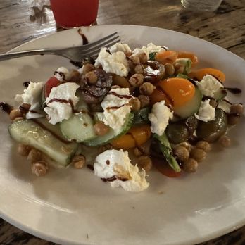 The Ozark Mill - Quirk cucumber & tomato salad... torn mozzarella, heirloom tomatoes m, fried garbanzo beans, lemon basil vinaigrette (market menu) - Venues & Event Spaces Near Me - Ozark, Missouri