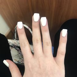 Ultra Nails & Tanning - Horrible, crooked nails! Never go here. My fingers are covered in acrylic. Worst nails I've ever had done