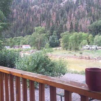 Ouray Riverside Inn and Cabins - View from Black Bear porch facing the stream. - Hotels Near Me - Ouray, Colorado Ouray Riverside Inn and Cabins - View from Black Bear porch facing the stream. - Hotels Near Me - Ouray, Colorado