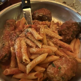 Carmelina's - The dish is called the Bronx tale. The dish includes sausage, meatballs and penne in a red sauce. - Italian Near Me - Boston, Massachusetts