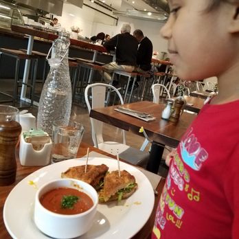 Sibling by Pushkin's - My daughter with her Adult grilled cheese and tomato soup (vegan). - New American Near Me - Sacramento, California