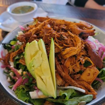 La Principal - a plate of food with meat and avocado - Mexican Near Me - Evanston, Illinois La Principal - a plate of food with meat and avocado - Mexican Near Me - Evanston, Illinois