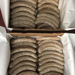Preparing 2 boxes of Boudins for a client. $150 worth of fresh store made boudins.