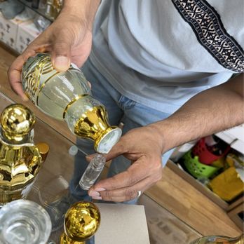 Paradise Perfumes - Pouring an oil blend I chose - Perfume Near Me - Palos Hills, Illinois Paradise Perfumes - Pouring an oil blend I chose - Perfume Near Me - Palos Hills, Illinois