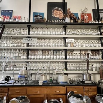 Bully Boy Distillers - a shelf full of empty glasses - Distilleries Near Me - Roxbury, Massachusetts