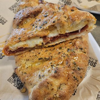 Parlour Pizza - Hot honey pepperoni calzone - Pizza Near Me - Lexington, Kentucky Parlour Pizza - Hot honey pepperoni calzone - Pizza Near Me - Lexington, Kentucky
