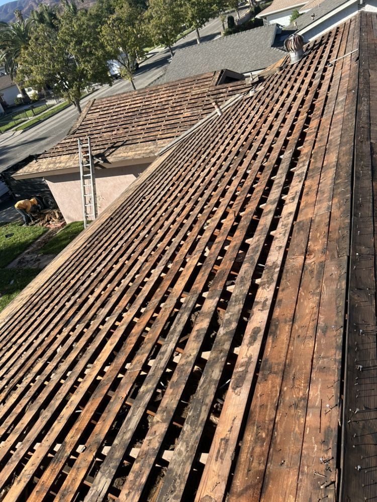 Slide of Blue J’s Roofing