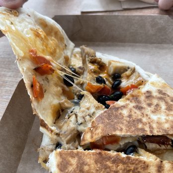 Tropical Smoothie Cafe - New Jerk Chicken Quesadilla - Juice Bars & Smoothies Near Me - Lansing, Michigan Tropical Smoothie Cafe - New Jerk Chicken Quesadilla - Juice Bars & Smoothies Near Me - Lansing, Michigan