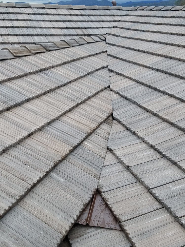 Slide of Trinity Roofing