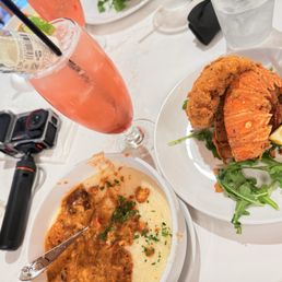 Fried lobster tail & Shrimp and Grits Fried lobster tail & Shrimp and Grits
