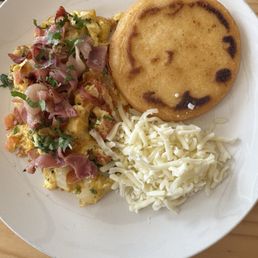 Criollo Breakfast (2 Arepas + Perico + Black Beans + Cheese + nata llanera) Dish Criollo Breakfast (2 Arepas + Perico + Black Beans + Cheese + nata llanera) Dish