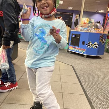 Chuck E. Cheese - Brooklynn and her prizes - Pizza Near Me - Sterling, Virginia