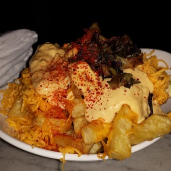 Trick Dog - 80. Manimal style fries ($7): house sauce, cheddar cheese, charred scallions - Cocktail Bars Near Me - San Francisco, California Trick Dog - 80. Manimal style fries ($7): house sauce, cheddar cheese, charred scallions - Cocktail Bars Near Me - San Francisco, California