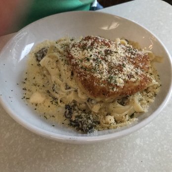 V Paul's - Fettuccine Alfredo with a pan-fried chicken breast and mushrooms - Italian Near Me - Pensacola, Florida