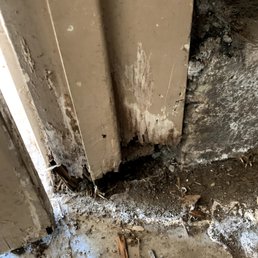 Before: damaged door jamb