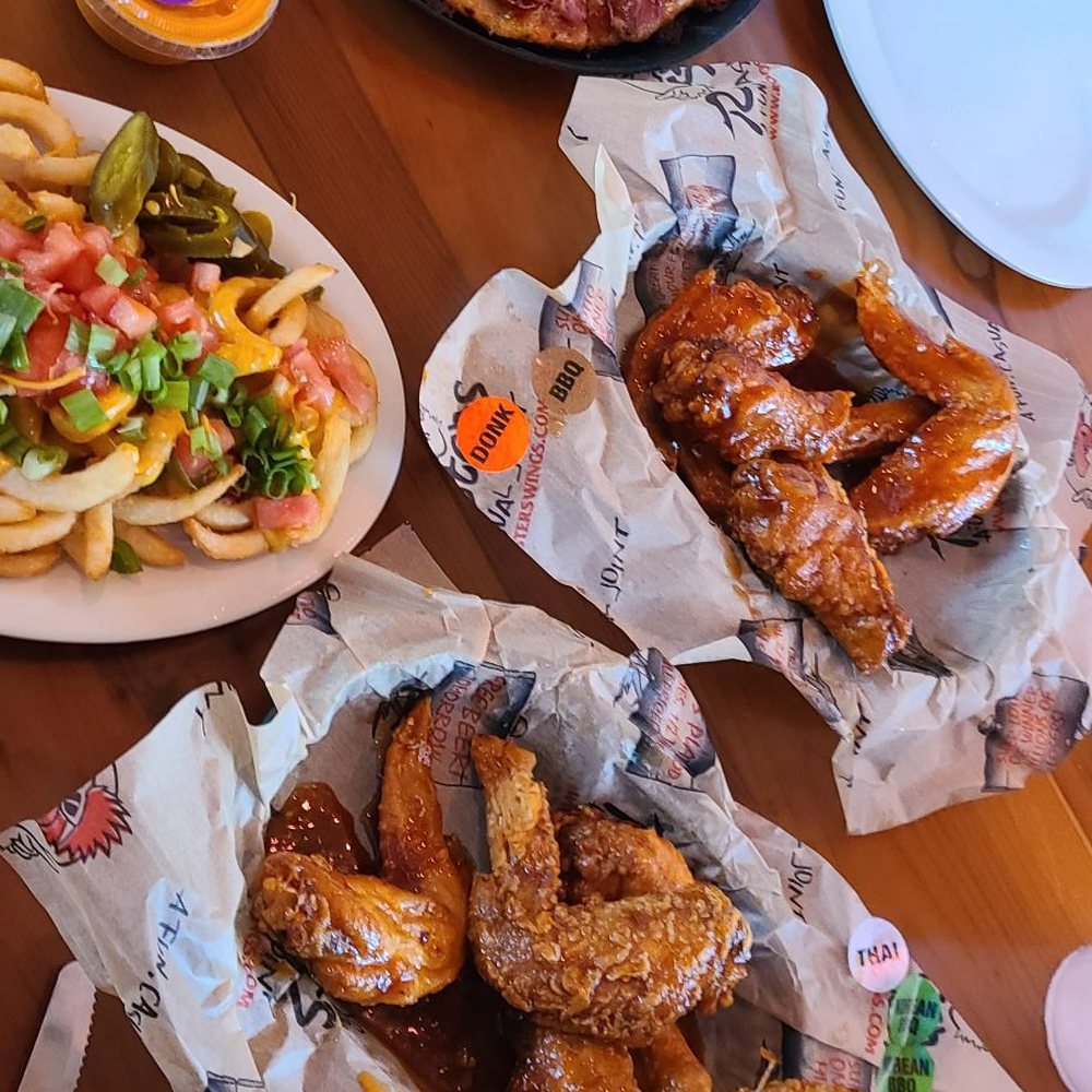Roosters - We shared the pizza, wings, and fries. - Chicken Wings Near Me - Lexington, Kentucky Roosters - We shared the pizza, wings, and fries. - Chicken Wings Near Me - Lexington, Kentucky