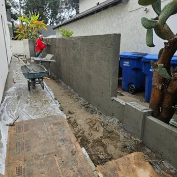 ParaBeach Plastering - Brown coating cinder block wall - Stucco Services Near Me