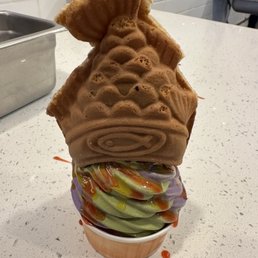 Matcha and Ube swirl with waffle fish stuffed with Nutella Matcha and Ube swirl with waffle fish stuffed with Nutella