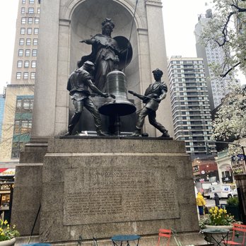 James Gordon Bennett Memorial - Goddess Minerva overseeing the bell ringers - Landmarks & Historical Buildings Near Me - New York, New York