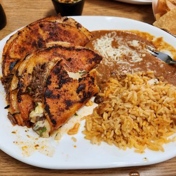 Rancho Grande Taqueria - Quesabirria , with a side of rice and beans - Mexican Near Me - Pleasanton, California Rancho Grande Taqueria - Quesabirria , with a side of rice and beans - Mexican Near Me - Pleasanton, California