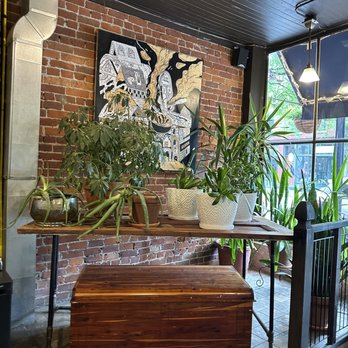 Soul Full Cup Coffeehouse - a brick wall with a painting on it - Coffee & Tea Near Me - Corning, New York Soul Full Cup Coffeehouse - a brick wall with a painting on it - Coffee & Tea Near Me - Corning, New York