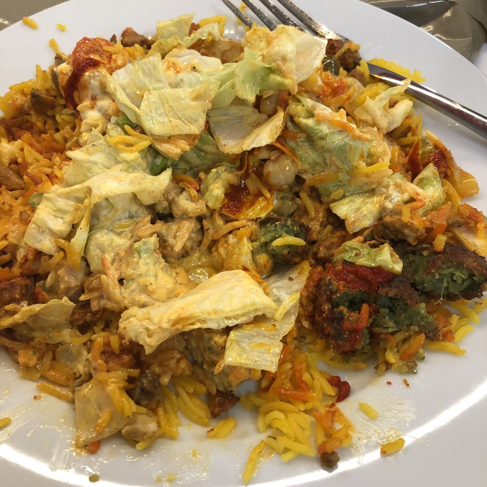Yassa Grill - Leftovers at work. Heated up my mega plate then topped with the salad they provide - Food Trucks Near Me - Lowell, Massachusetts Yassa Grill - Leftovers at work. Heated up my mega plate then topped with the salad they provide - Food Trucks Near Me - Lowell, Massachusetts