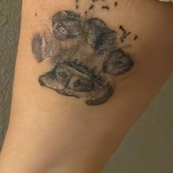 Red Shores Tattoo - Before, supposed to be my dogs paw print with her face in the middle. - Piercing Near Me - Houston, Texas Red Shores Tattoo - Before, supposed to be my dogs paw print with her face in the middle. - Piercing Near Me - Houston, Texas