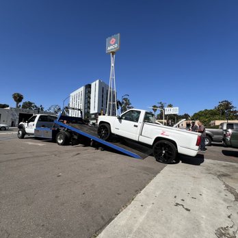 Westside Towing - Unloading customers truck off at local repair shop. - Towing Near Me Westside Towing - Unloading customers truck off at local repair shop. - Towing Near Me