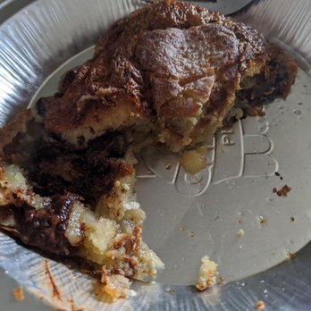 Arsicault Bakery - Chocolate almond croissant, filling exposed, shelter in place - Bakeries Near Me - San Francisco, California Arsicault Bakery - Chocolate almond croissant, filling exposed, shelter in place - Bakeries Near Me - San Francisco, California