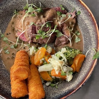 Sallie's Bistro - Filet with potato croquettes in an au poivre sauce - Belgian Near Me - Dunedin, Florida Sallie's Bistro - Filet with potato croquettes in an au poivre sauce - Belgian Near Me - Dunedin, Florida