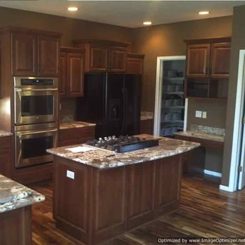 Signature Home Improvements - Kitchen redesign in Alder with a Dark Finish - General Contractors Near Me Signature Home Improvements - Kitchen redesign in Alder with a Dark Finish - General Contractors Near Me