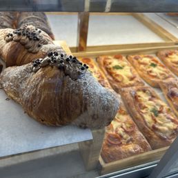 Nutella crossiant, pepperoni flatbread in background