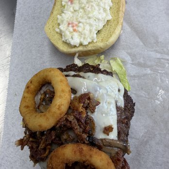 Crispy Corner - Classic smashed cheeseburger with the crispy bacon onion rings coleslaw lettuce, tomatoes, onions pickles and a little bit of ketchup - Food Trucks Near Me - Monroe, Michigan