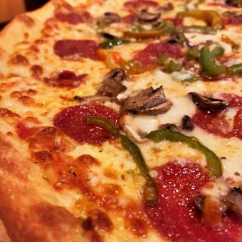 Nik's - Pizza with pepperoni, 'shrooms, and green pepper. - Steakhouses Near Me - Berryville, Virginia Nik's - Pizza with pepperoni, 'shrooms, and green pepper. - Steakhouses Near Me - Berryville, Virginia