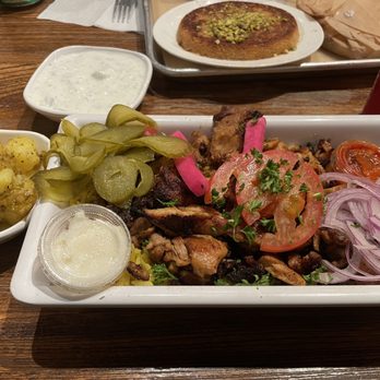 Mazra - Shawarma Plate - Chicken with Garlic Roasted Potatoes & Cucumber Yoghurt for sides. Kunafa is also pictured - Middle Eastern Near Me - San Bruno, California Mazra - Shawarma Plate - Chicken with Garlic Roasted Potatoes & Cucumber Yoghurt for sides. Kunafa is also pictured - Middle Eastern Near Me - San Bruno, California