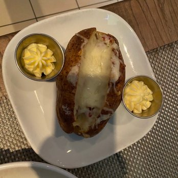 Cuts Steakhouse - Baked Potato with cheese , bacon - Steakhouses Near Me - Atlanta, Georgia Cuts Steakhouse - Baked Potato with cheese , bacon - Steakhouses Near Me - Atlanta, Georgia