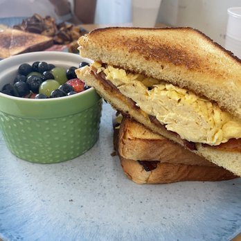Fork N Spoon - Bacon Egg and Cheese Melt with a side of fruit - Breakfast & Brunch Near Me - Baton Rouge, Louisiana Fork N Spoon - Bacon Egg and Cheese Melt with a side of fruit - Breakfast & Brunch Near Me - Baton Rouge, Louisiana