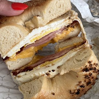 Bagels With Deli - The New Yorker on an onion bagel - Breakfast & Brunch Near Me - Delray Beach, Florida