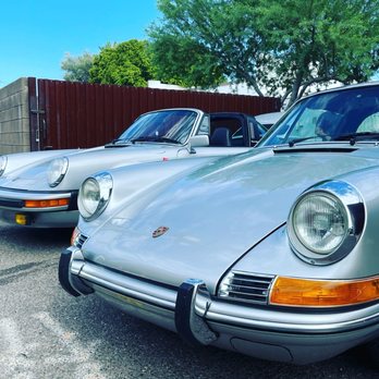 Fourtillfour - two porsches parked in a parking lot - Coffee & Tea Near Me - Scottsdale, Arizona