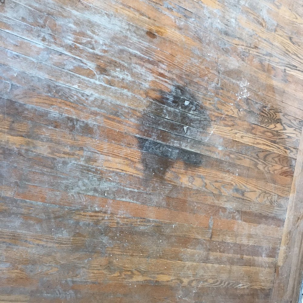 H & T Flooring - Condition of a portion of the floor before work commenced. - Flooring Near Me