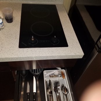 TownePlace Suites Temple - suite: kitchenette with stovetop and utensils - Hotels Near Me - Temple, Texas