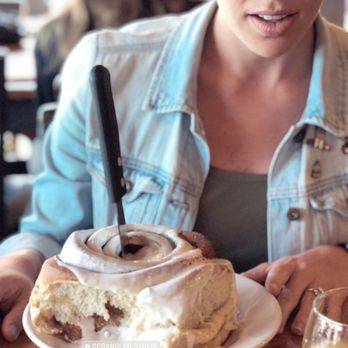 Scrambled Jake's - Pictured: Cinnamon Roll (left), Madison in astonishment (right) - Breakfast & Brunch Near Me - Knoxville, Tennessee Scrambled Jake's - Pictured: Cinnamon Roll (left), Madison in astonishment (right) - Breakfast & Brunch Near Me - Knoxville, Tennessee