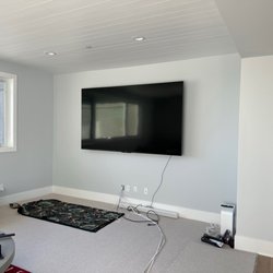 Hangtech - 98" TCL. Cabinetry coming next for a finished look!