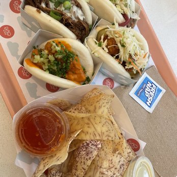 Bao Nine - From top left going clockwise: Bao Bao (short rib), Yenta (pastrami), Mutha Clucka (buffalo chicken), Crispy chick (fried chicken). - Taiwanese Near Me - Philadelphia, Pennsylvania