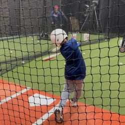 Diamond Kids Baseball Academy - Head still, nose down to the ball, and staying behind the barrel, driving the baseball to the big part of the field.