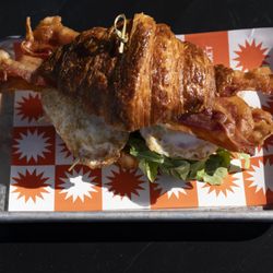 Avila Market - Croissant Sandwich- Boursin cheese, bacon,fried egg, arugula and tomato on a croissant or sourdough bread.