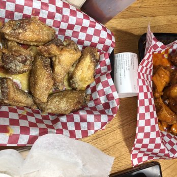 TLC Wings & Grill - Garlic Parmesan wings on the left. Hot buffalo wings on the right. - Chicken Wings Near Me - Raleigh, North Carolina