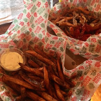 Moo & Brew - Rosemary & truffle fries on the left and Parmesan fries on the right - Beer Bar Near Me - Charlotte, North Carolina